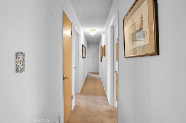 18944 Prairie St, Northridge, CA 91324 - hall featuring a textured ceiling and light carpet