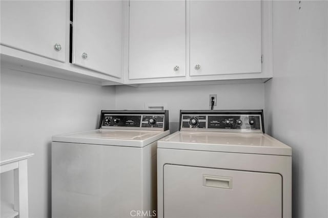 18944 Prairie St, Northridge, CA 91324 - washroom with separate washer and dryer and cabinet space