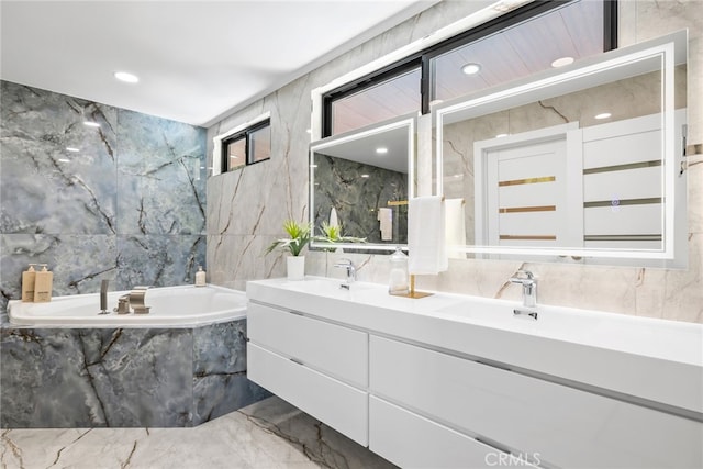 20101 Greenbriar Dr, Tarzana, CA 91356 - full bath featuring tile walls, marble tiled floors, a bath, and double vanity