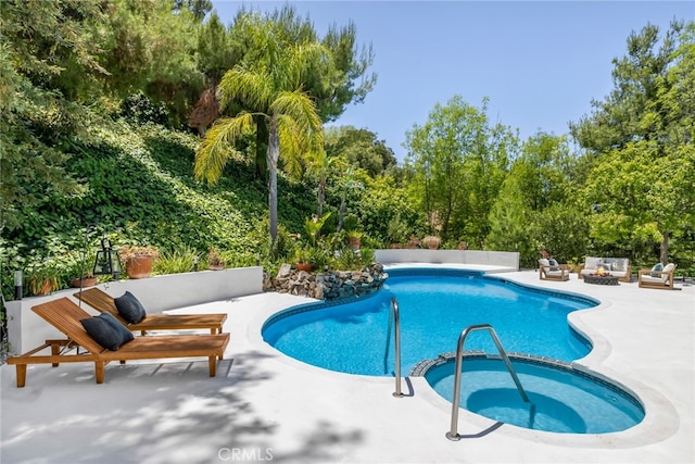 20101 Greenbriar Dr, Tarzana, CA 91356 - view of pool featuring outdoor lounge area, a patio area, view of scattered trees, and a pool with connected hot tub
