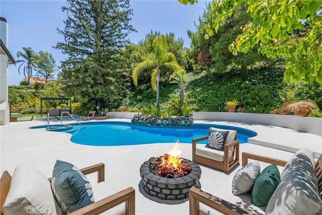 20101 Greenbriar Dr, Tarzana, CA 91356 - outdoor pool with an outdoor living space with a fire pit and a patio area