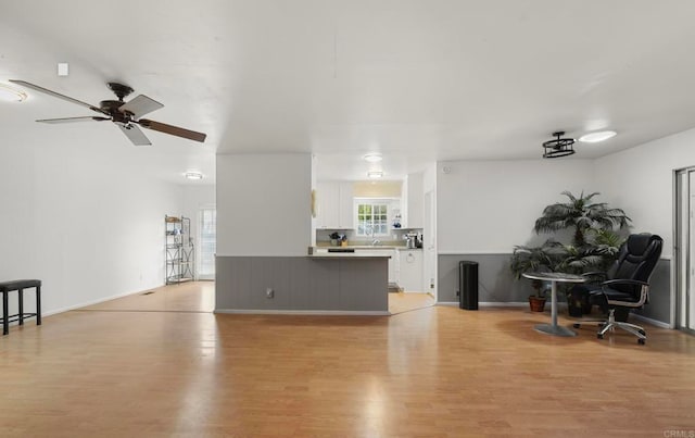 3168 Florine Dr, Lemon Grove, CA 91945 - living room with light wood-style flooring and a ceiling fan