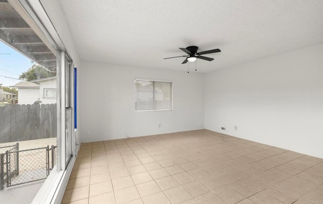 3168 Florine Dr, Lemon Grove, CA 91945 - unfurnished room featuring a ceiling fan, plenty of natural light, and a textured ceiling
