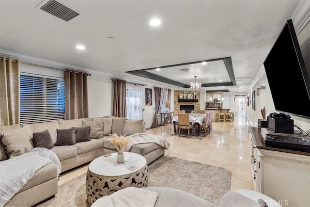 17635 Verde St, Hesperia, CA 92345 - living area featuring a raised ceiling, crown molding, recessed lighting, and a chandelier