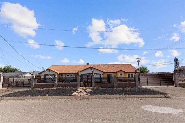 17635 Verde St, Hesperia, CA 92345 - ranch-style home with a fenced front yard and a gate