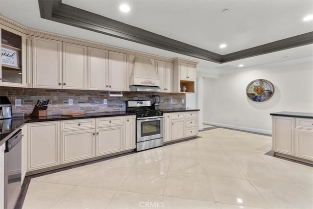 17635 Verde St, Hesperia, CA 92345 - kitchen featuring appliances with stainless steel finishes, a tray ceiling, premium range hood, crown molding, and backsplash
