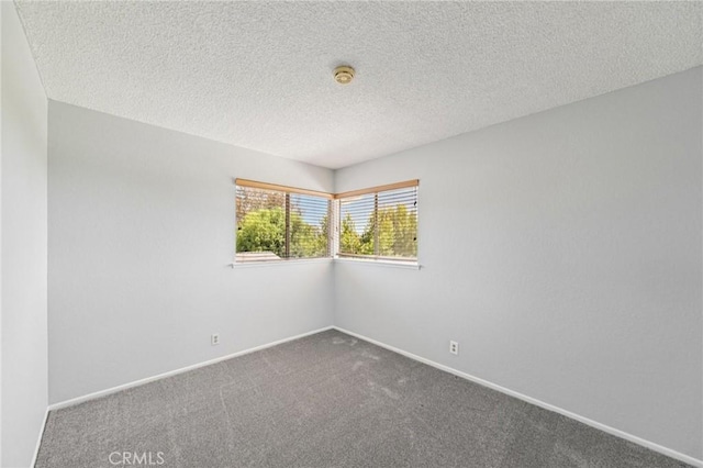 23441 Via Ronda, Mission Viejo, CA 92691 - carpeted spare room featuring a textured ceiling and a smoke detector