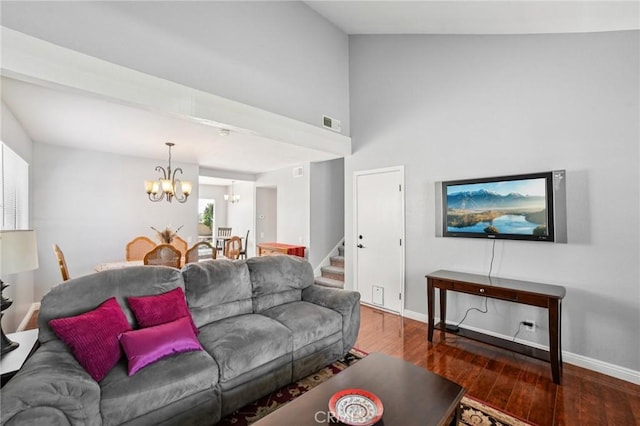 23441 Via Ronda, Mission Viejo, CA 92691 - living area with a chandelier, wood finished floors, a towering ceiling, and stairs