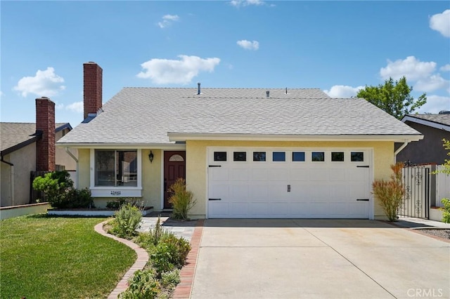 23441 Via Ronda, Mission Viejo, CA 92691 - view of front facade with a garage, driveway, stucco siding, and a front yard