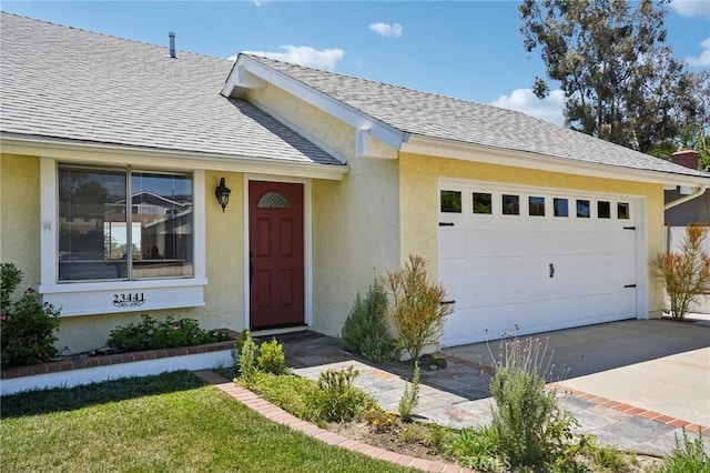 23441 Via Ronda, Mission Viejo, CA 92691 - view of front of property with a garage, a shingled roof, stucco siding, and concrete driveway