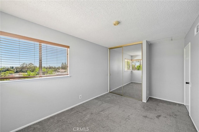 23441 Via Ronda, Mission Viejo, CA 92691 - unfurnished bedroom with carpet, a closet, and a textured ceiling
