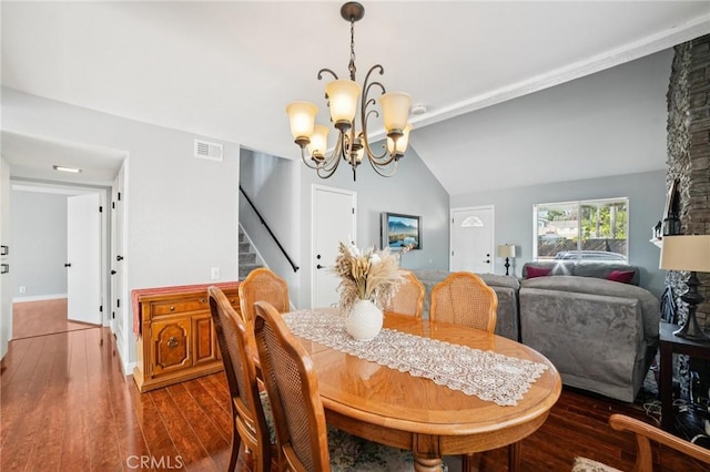 23441 Via Ronda, Mission Viejo, CA 92691 - dining area featuring stairway, a chandelier, wood finished floors, and vaulted ceiling