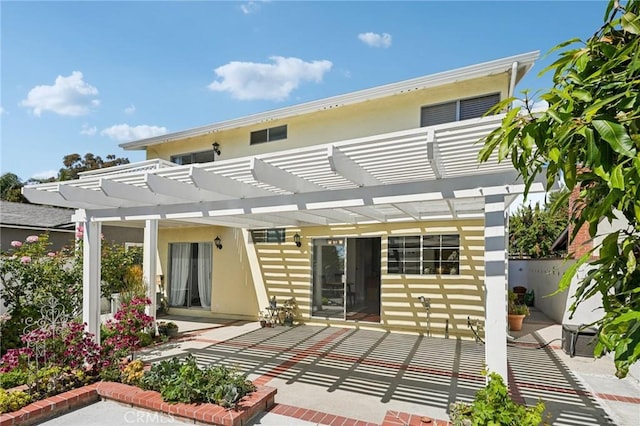 23441 Via Ronda, Mission Viejo, CA 92691 - back of property featuring a patio area, stucco siding, and a pergola