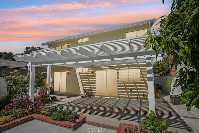 23441 Via Ronda, Mission Viejo, CA 92691 - back of house with stucco siding, a pergola, and a patio
