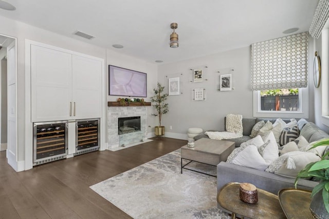 5414 Foxtail Loop, Carlsbad, CA 92010 - living room with wine cooler, dark wood-type flooring, and a fireplace with flush hearth