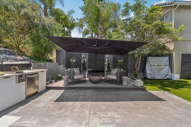 5414 Foxtail Loop, Carlsbad, CA 92010 - view of patio with an outdoor kitchen and a wooden deck