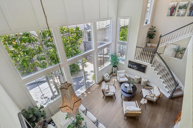 5414 Foxtail Loop, Carlsbad, CA 92010 - living room with stairway, wood finished floors, and a high ceiling