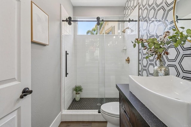 5414 Foxtail Loop, Carlsbad, CA 92010 - full bath with a shower stall, vanity, and wood finished floors