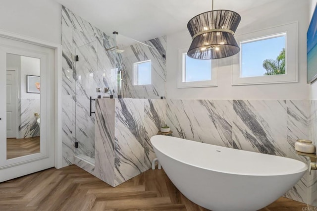 5414 Foxtail Loop, Carlsbad, CA 92010 - bathroom with plenty of natural light, tile walls, a marble finish shower, and a freestanding tub