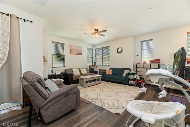 677 Savi Dr Unit 101, Corona, CA 92878 - living room featuring wood finished floors and ceiling fan