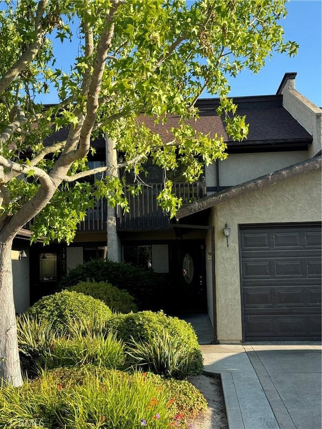 1107 Grieb Dr, Arroyo Grande, CA 93420 - view of front facade featuring stucco siding and an attached garage