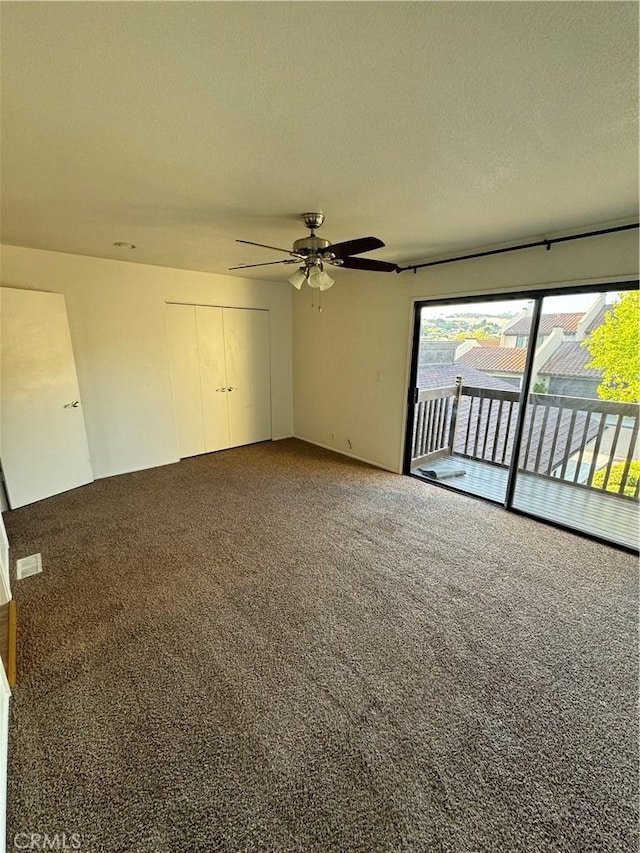 1107 Grieb Dr, Arroyo Grande, CA 93420 - empty room featuring carpet floors, a ceiling fan, and a textured ceiling