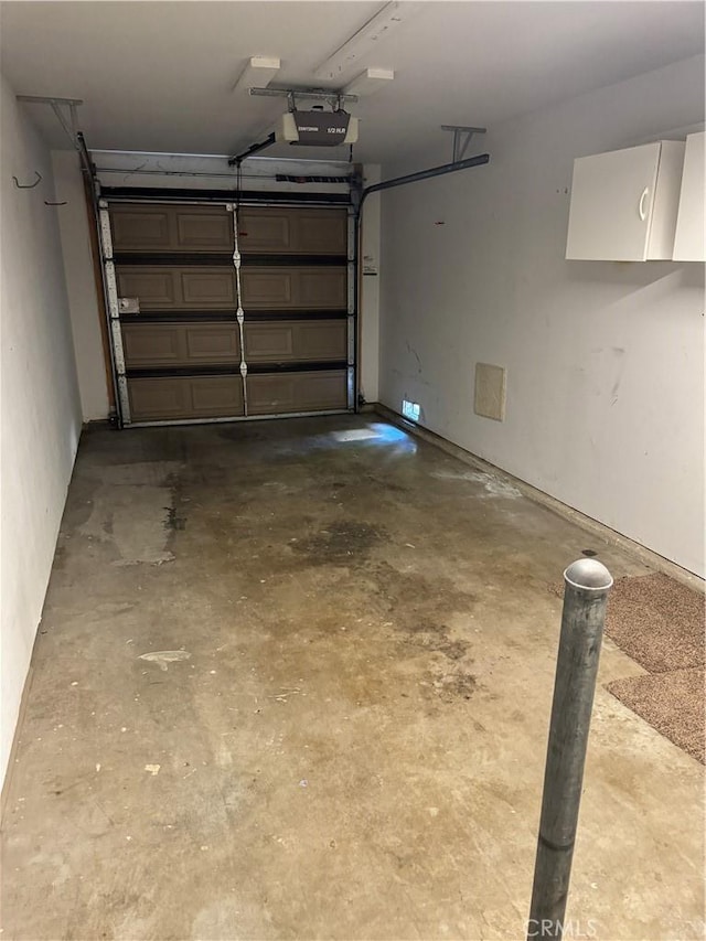 1107 Grieb Dr, Arroyo Grande, CA 93420 - garage featuring a garage door opener