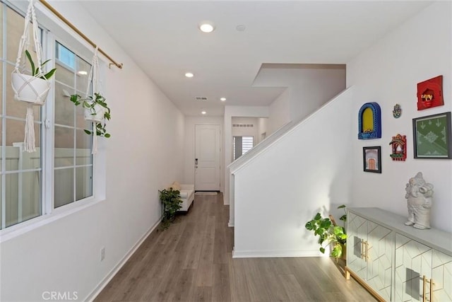 2275 Melogold Way, Corona, CA 92883 - hallway featuring wood finished floors, stairway, and recessed lighting