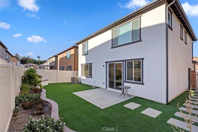 2275 Melogold Way, Corona, CA 92883 - back of property featuring a fenced backyard, a patio, and stucco siding