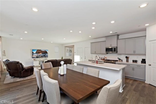 2275 Melogold Way, Corona, CA 92883 - dining area featuring dark wood-type flooring and recessed lighting