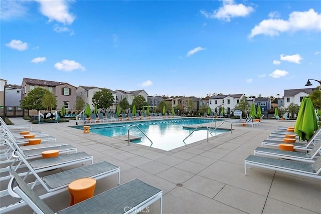 2275 Melogold Way, Corona, CA 92883 - community pool featuring a residential view and a patio