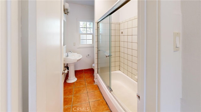 1143 N Sycamore Ave, Los Angeles, CA 90038 - bathroom featuring tile patterned flooring and combined bath / shower with glass door