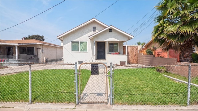 4045 Dennison St, Los Angeles, CA 90023 - bungalow-style house with a gate, stucco siding, and a fenced front yard