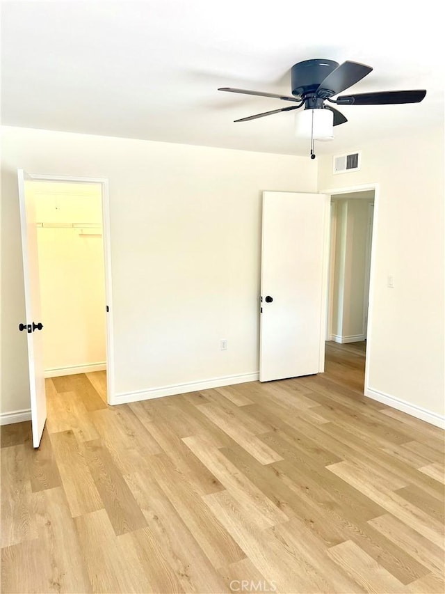 29041 Desert Hills Rd, Menifee, CA 92586 - unfurnished room featuring light wood-style floors and ceiling fan
