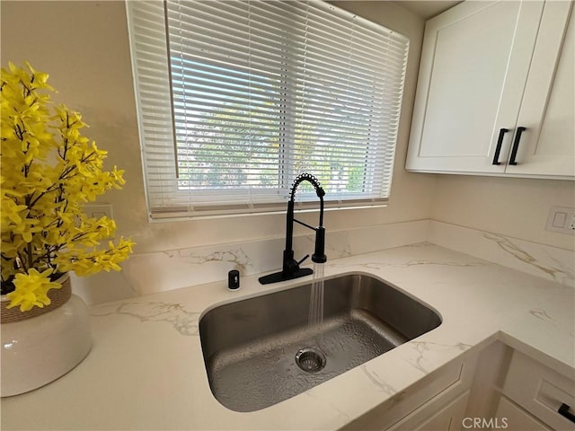 29041 Desert Hills Rd, Menifee, CA 92586 - kitchen view of white cabinetry and light stone countertops