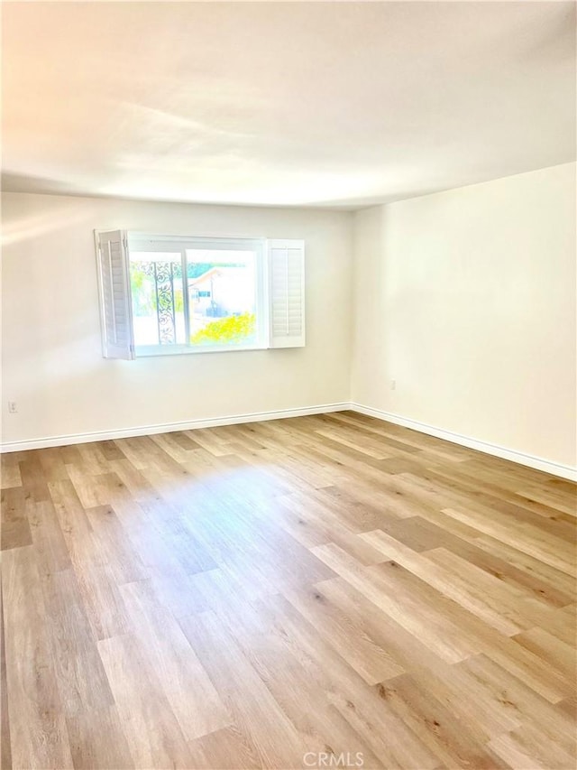 29041 Desert Hills Rd, Menifee, CA 92586 - spare room with wood finished floors and baseboards