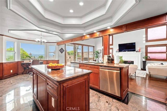 22410 Starwood Dr, Yorba Linda, CA 92887 - kitchen with dishwasher, a center island, crown molding, open floor plan, and a fireplace