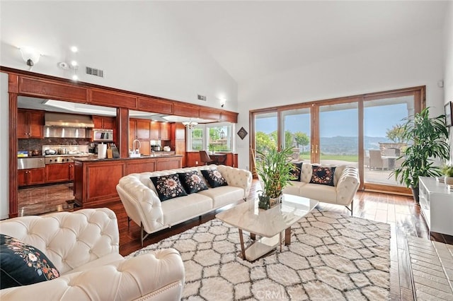 22410 Starwood Dr, Yorba Linda, CA 92887 - living room featuring high vaulted ceiling and wood finished floors