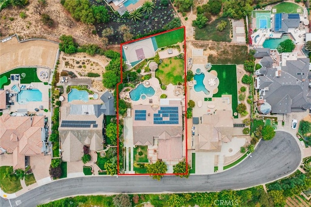 22410 Starwood Dr, Yorba Linda, CA 92887 - aerial perspective of suburban area with a pool and property boundaries highlighted