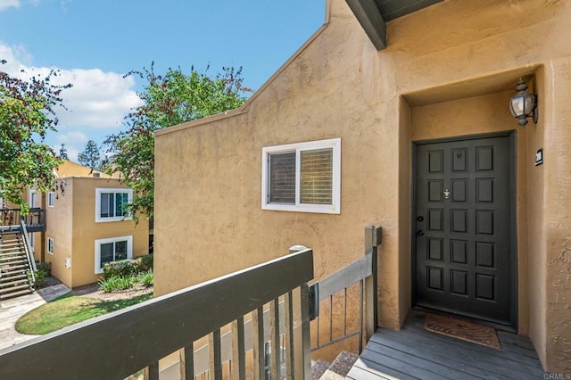17181 W Bernardo Dr Unit 208, San Diego, CA 92127 - entrance to property featuring stucco siding and a balcony