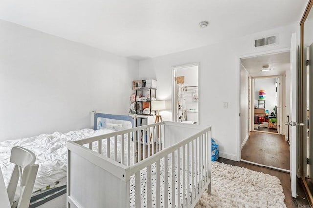 17181 W Bernardo Dr Unit 208, San Diego, CA 92127 - bedroom featuring wood finished floors and baseboards