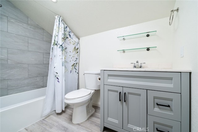 6001 Via De Mansion, La Verne, CA 91750 - full bathroom featuring lofted ceiling, wood finished floors, vanity, and shower / bathtub combination with curtain