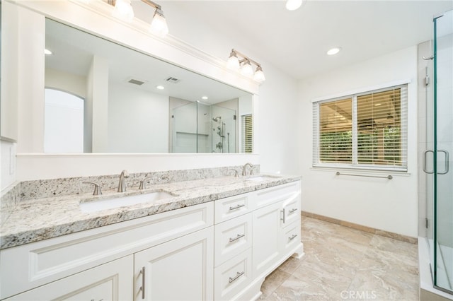 6001 Via De Mansion, La Verne, CA 91750 - bathroom with double vanity, a shower stall, and recessed lighting