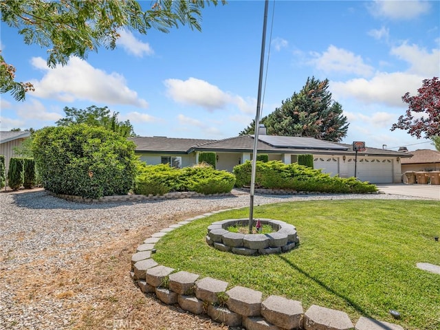 7556 Glider Ave, Hesperia, CA 92345 - single story home featuring a front lawn, solar panels, driveway, and a garage