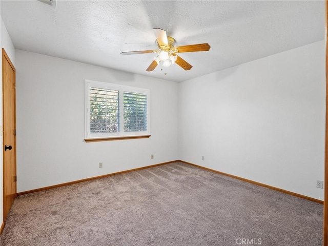 7556 Glider Ave, Hesperia, CA 92345 - spare room featuring carpet flooring, ceiling fan, and a textured ceiling