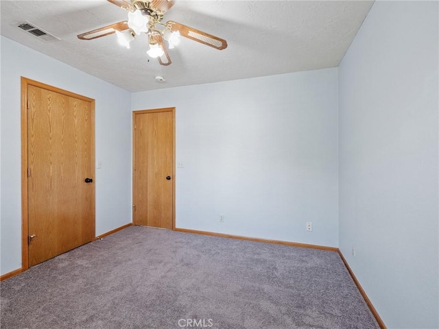 7556 Glider Ave, Hesperia, CA 92345 - carpeted empty room with baseboards and ceiling fan