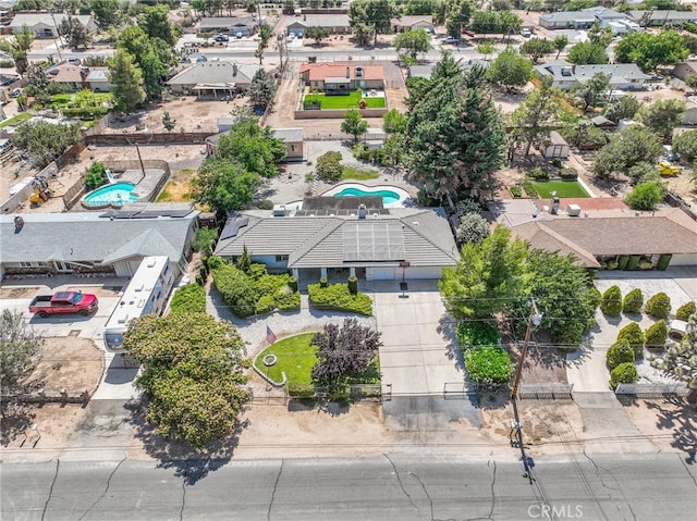 7556 Glider Ave, Hesperia, CA 92345 - aerial view of residential area with a pool area