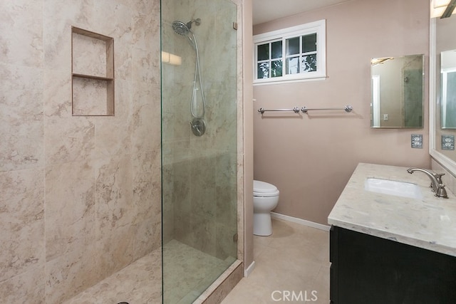8398 Shoup Ave, West Hills, CA 91304 - bathroom with tiled shower, vanity, and tile patterned flooring