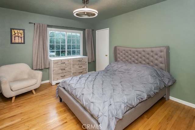 8398 Shoup Ave, West Hills, CA 91304 - bedroom featuring wood finished floors and baseboards