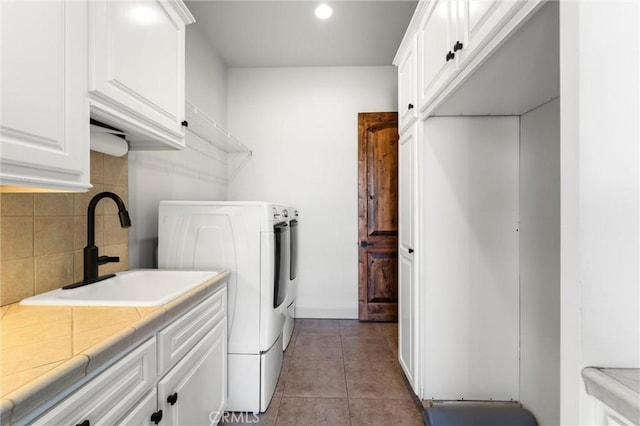 54774 Bautista Rd, Anza, CA 92539 - laundry room with washer and clothes dryer, cabinet space, tile patterned floors, and recessed lighting